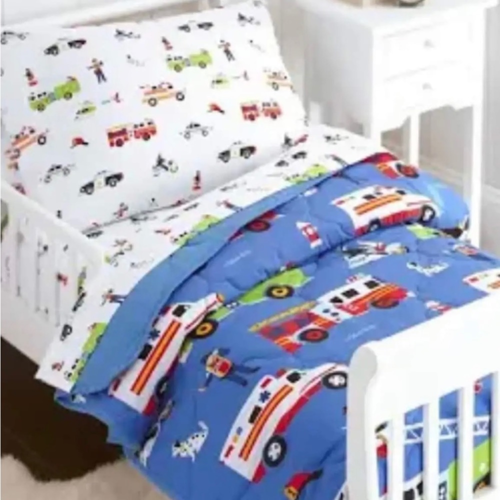 HEROES 4 piece toddler bedding set by Wildkin.  Great condition.